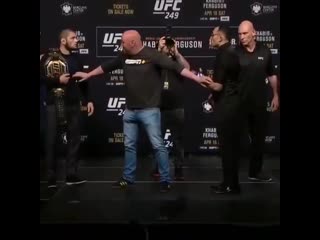 khabib kicks tony ferguson's belt